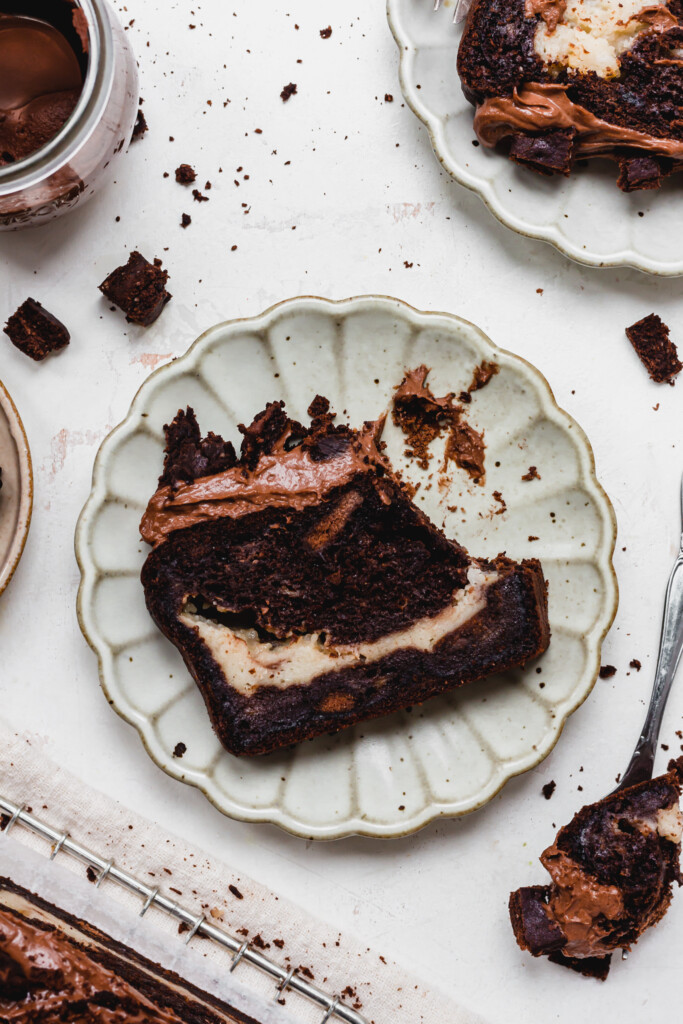 A slice of Chocolate Bourbon Biscuit Banana Bread with a fork