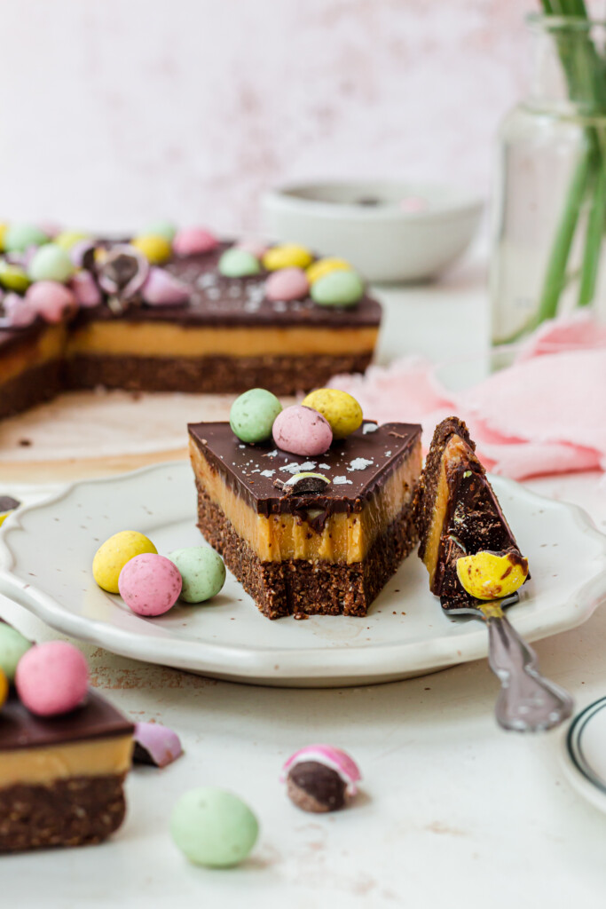 A slice of Chocolate Caramel Mini Egg Slices with a fork