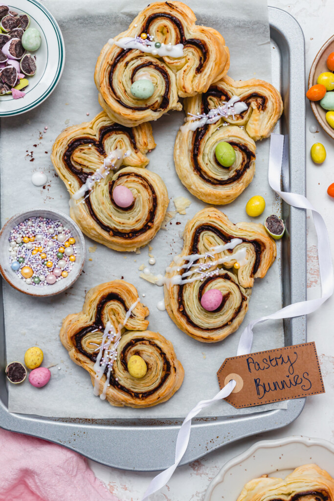 Five Chocolate Easter Pastry Bunnies on a metal tray