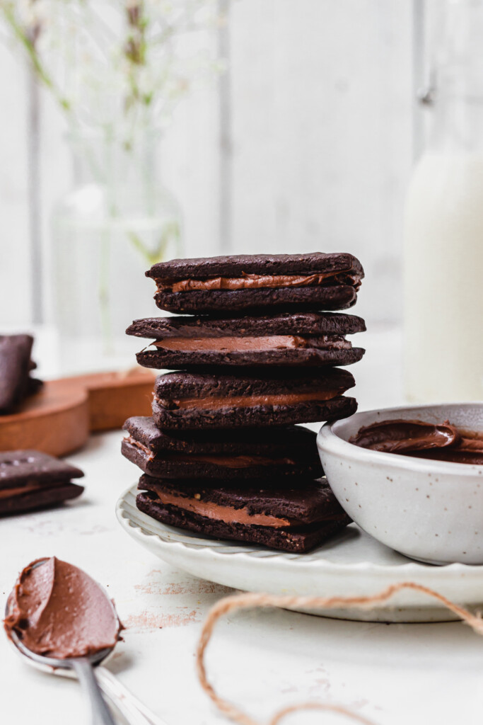 A stack of five Homemade Healthier Vegan Bourbon Biscuits on a plate