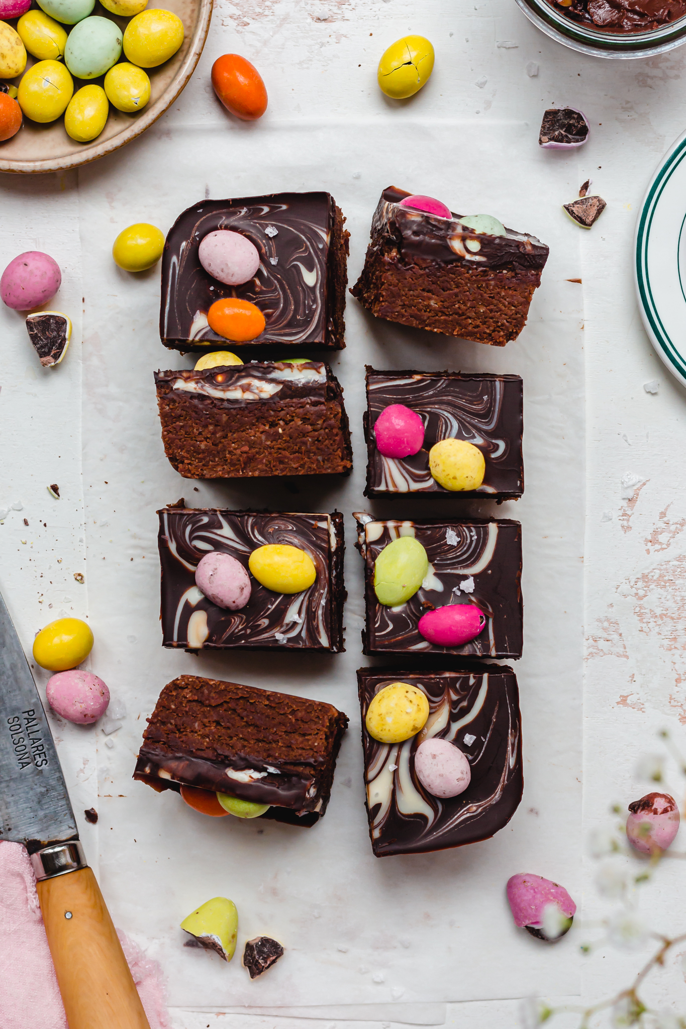 Eight pieces of Mini Egg Chocolate Marble Protein Bars on a board