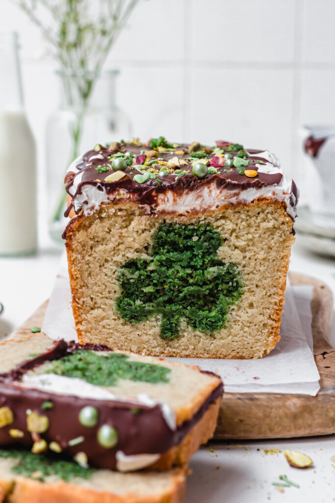 A St Patrick's Day Loaf Cake on a wooden board
