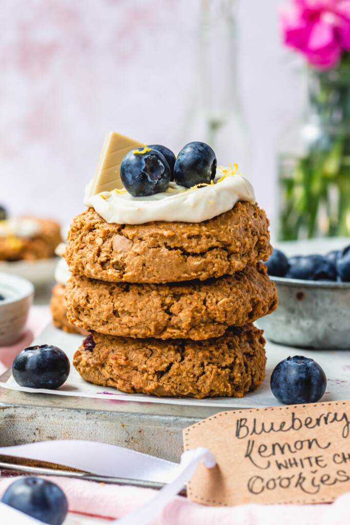 A stack of three Blueberry Lemon White Chocolate Oat Cookies