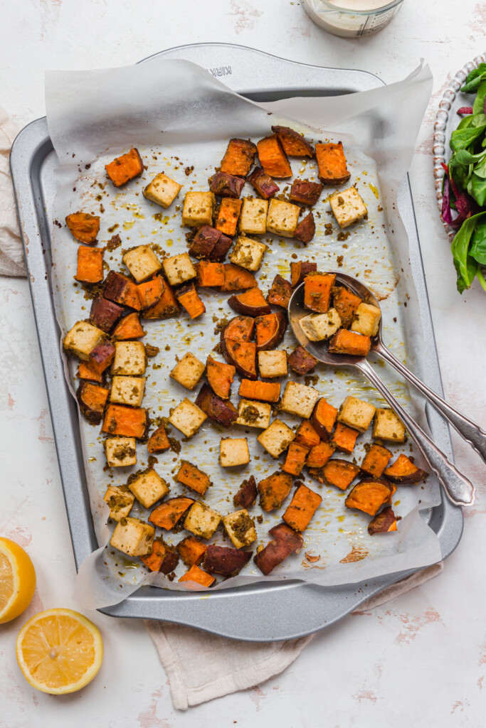 A tray of roasted sweet potato and tofu cubes