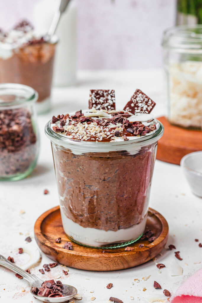 A jar of Chocolate Coconut Blended Oats with chocolate on top