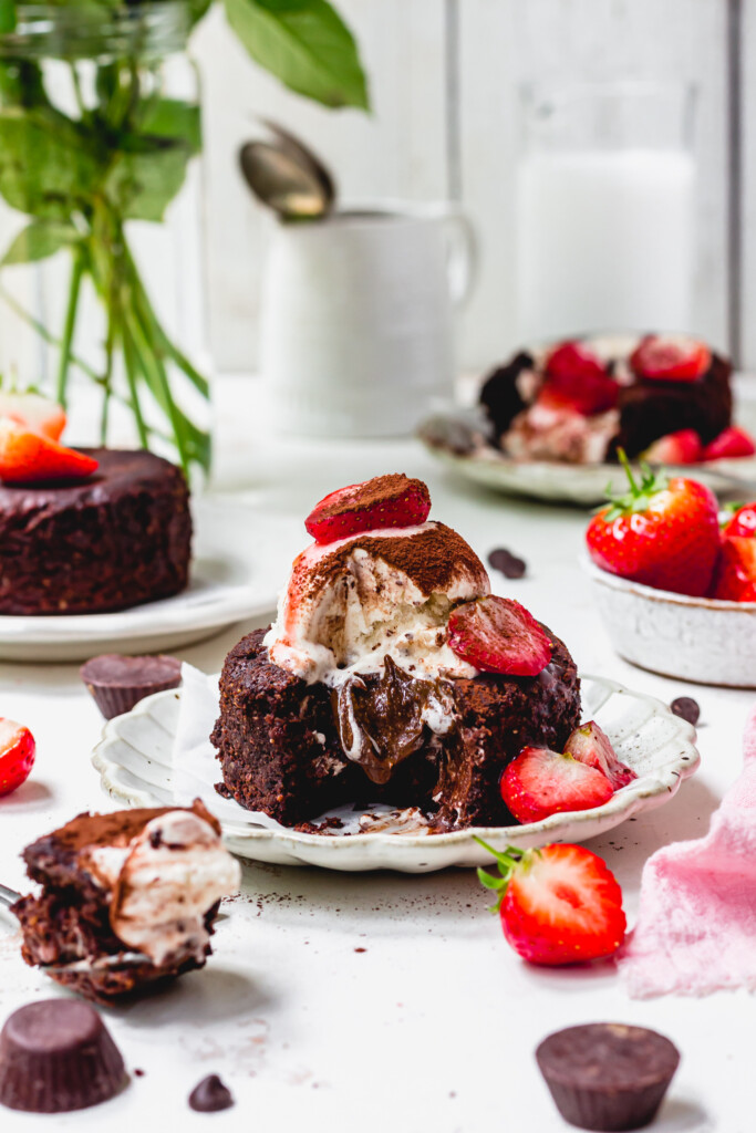 A Chocolate Strawberry Brownie Lava Cake with a gooey chocolate middle