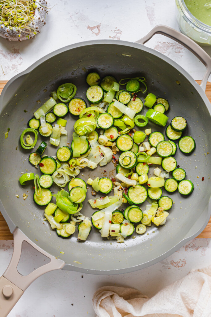 A pan of leeks, courgettes and chilli