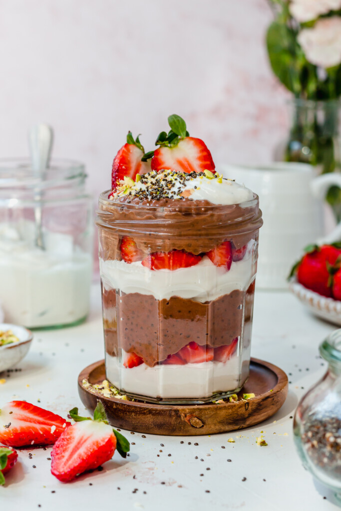 A jar of Chocolate Strawberry Chia Pudding with layers