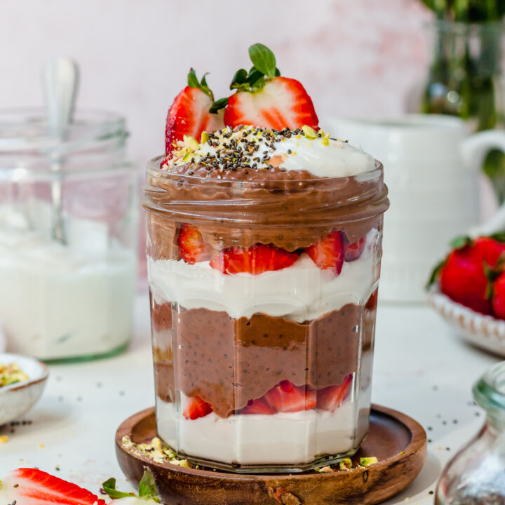 A jar of Chocolate Strawberry Chia Pudding with layers