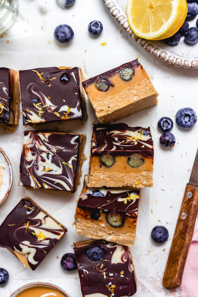 Close up of a few Lemon and Blueberry Chocolate Caramel Slices