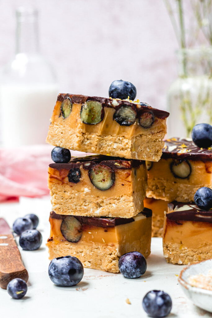 A stack of three Lemon and Blueberry Chocolate Caramel Slices