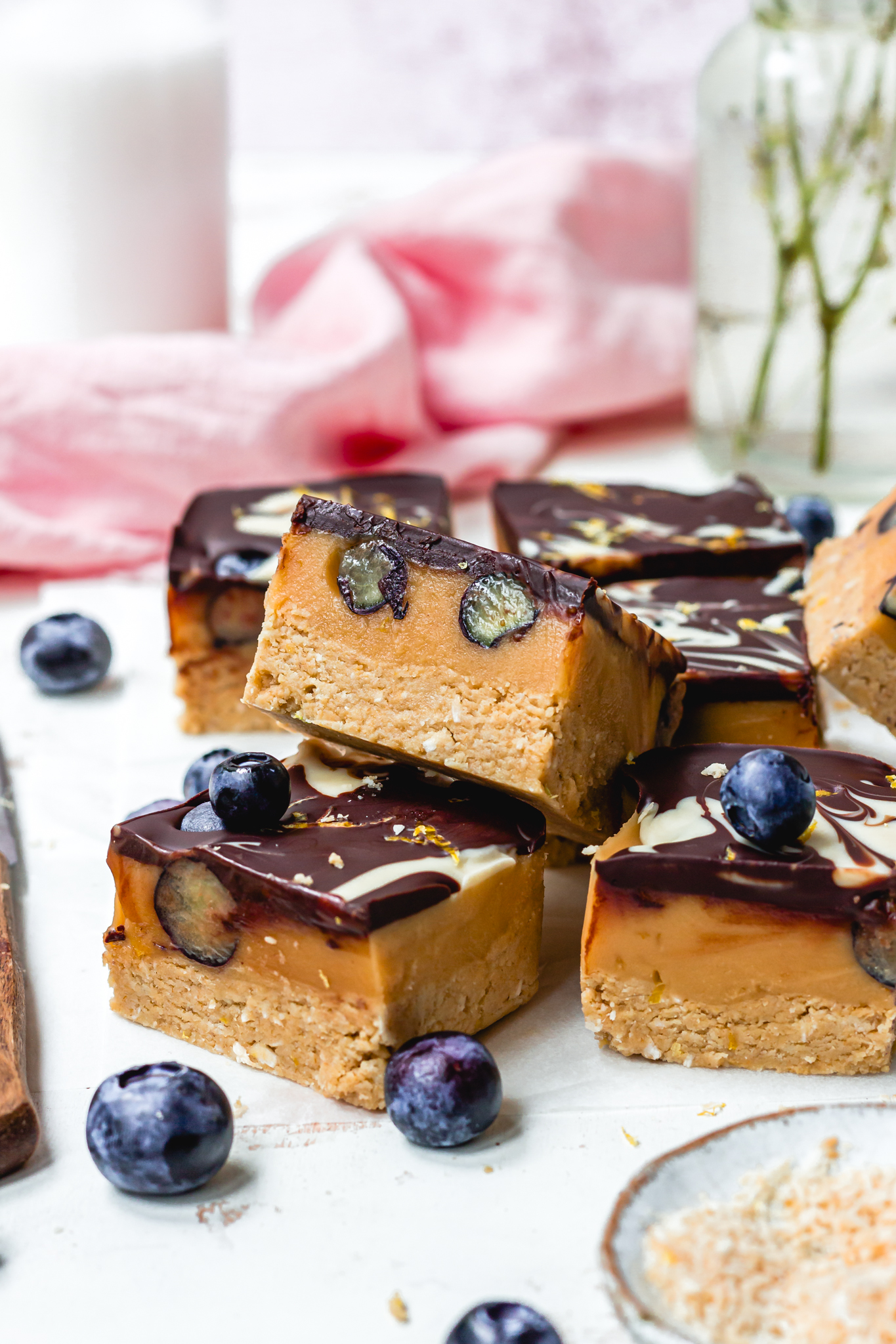 A few Lemon and Blueberry Chocolate Caramel Slices