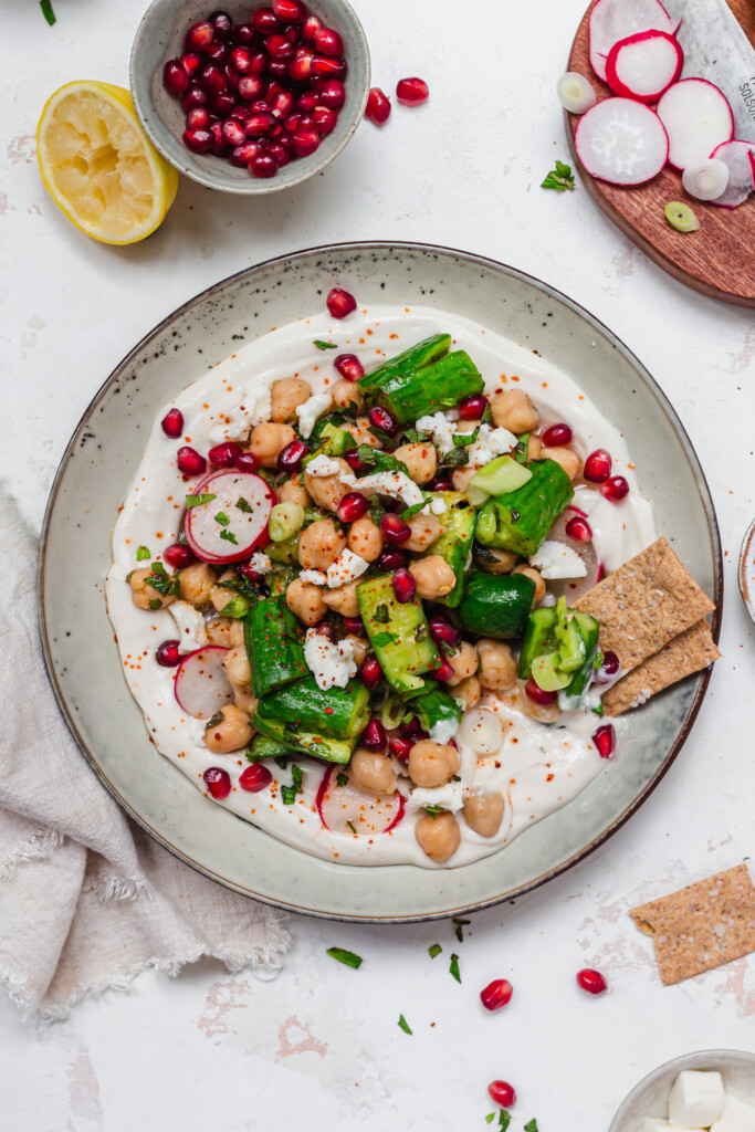 Smashed Cucumber and Chickpea Salad with yoghurt and crackers