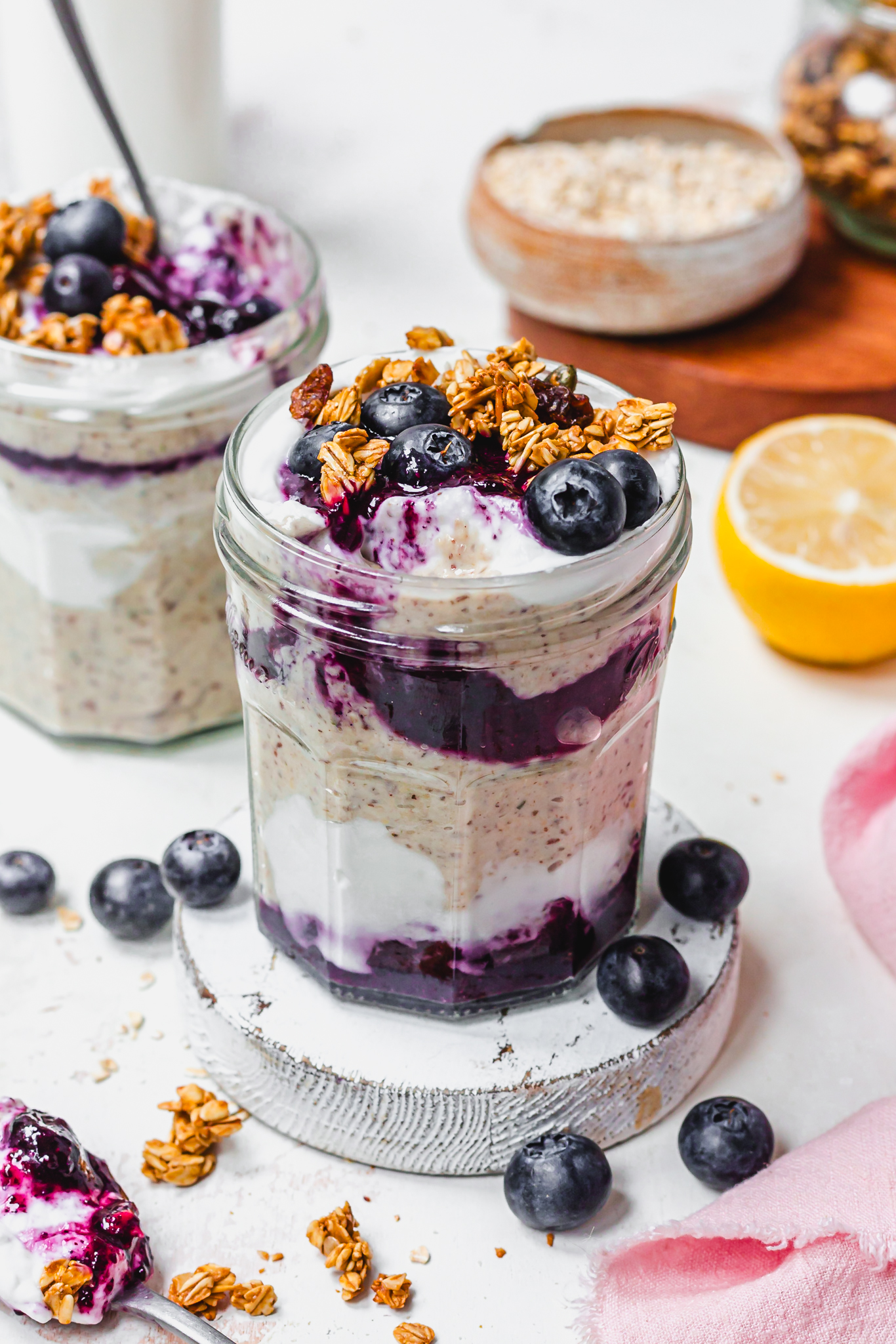 A jar of Lemon Blueberry Blended Oats with granola and yoghurt