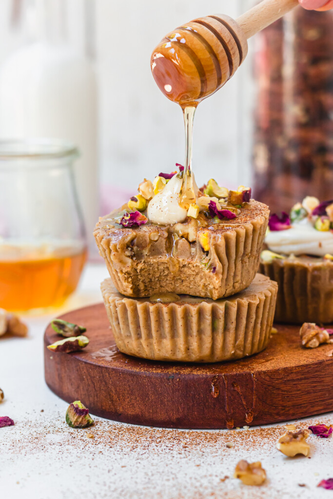 Drizzling vegan honey over Baklava-Style Fudge Cups