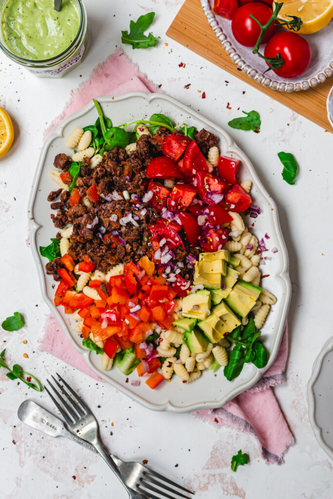 Undressed Guacamole Pasta Salad with black beans and tomatoes