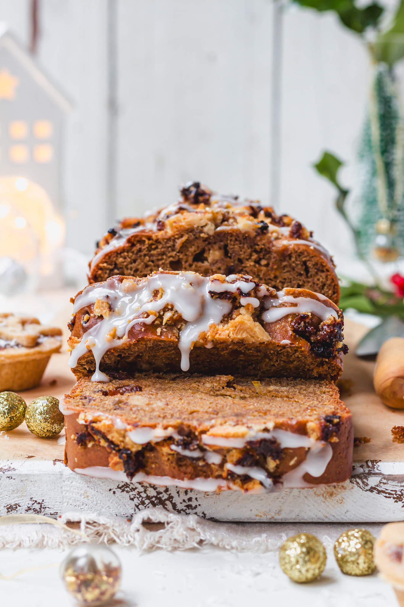 A Mince Pie Loaf Cake with dripping icing sugar