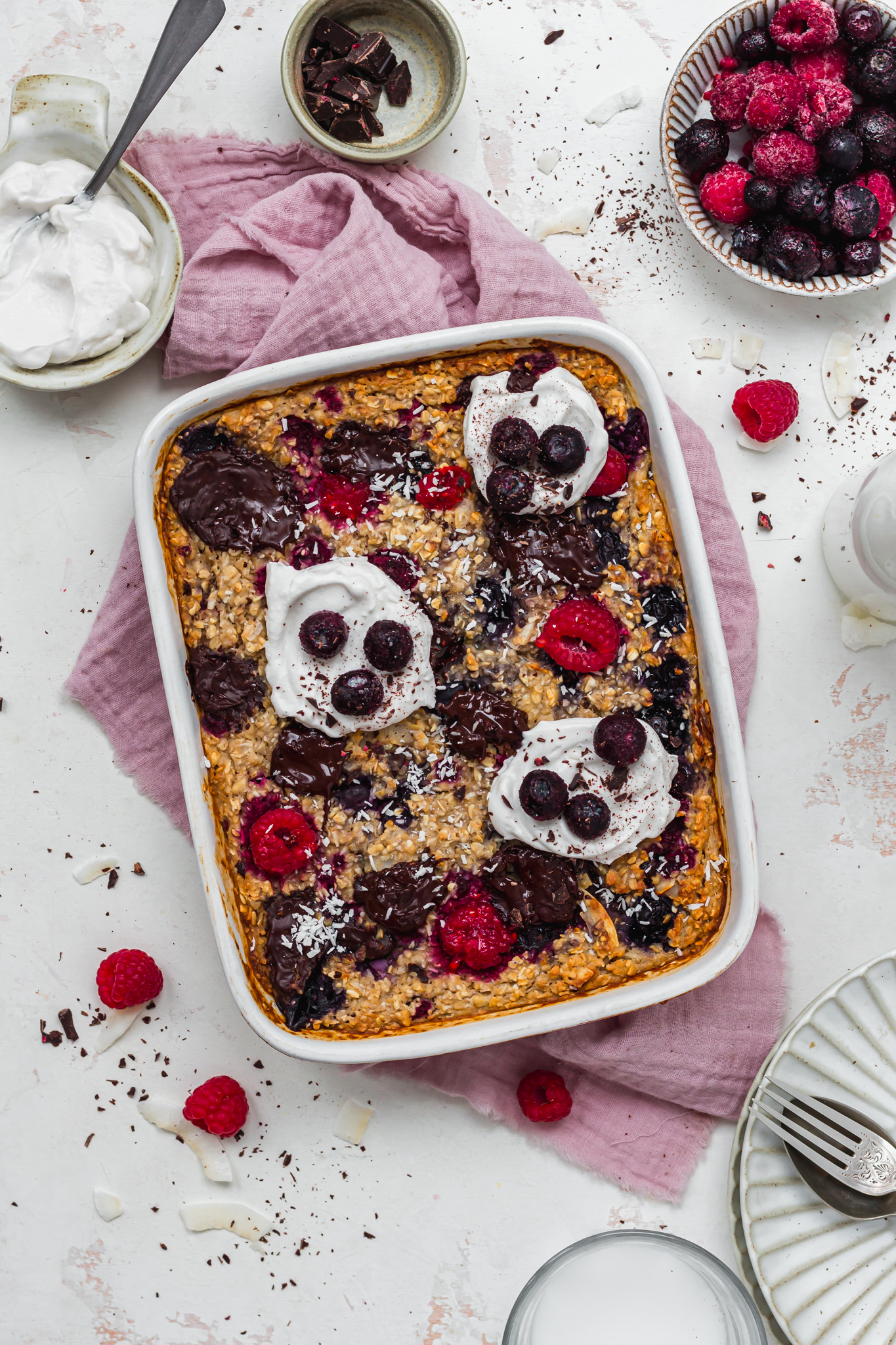 A dish of Chocolate Coconut Berry Baked Oats