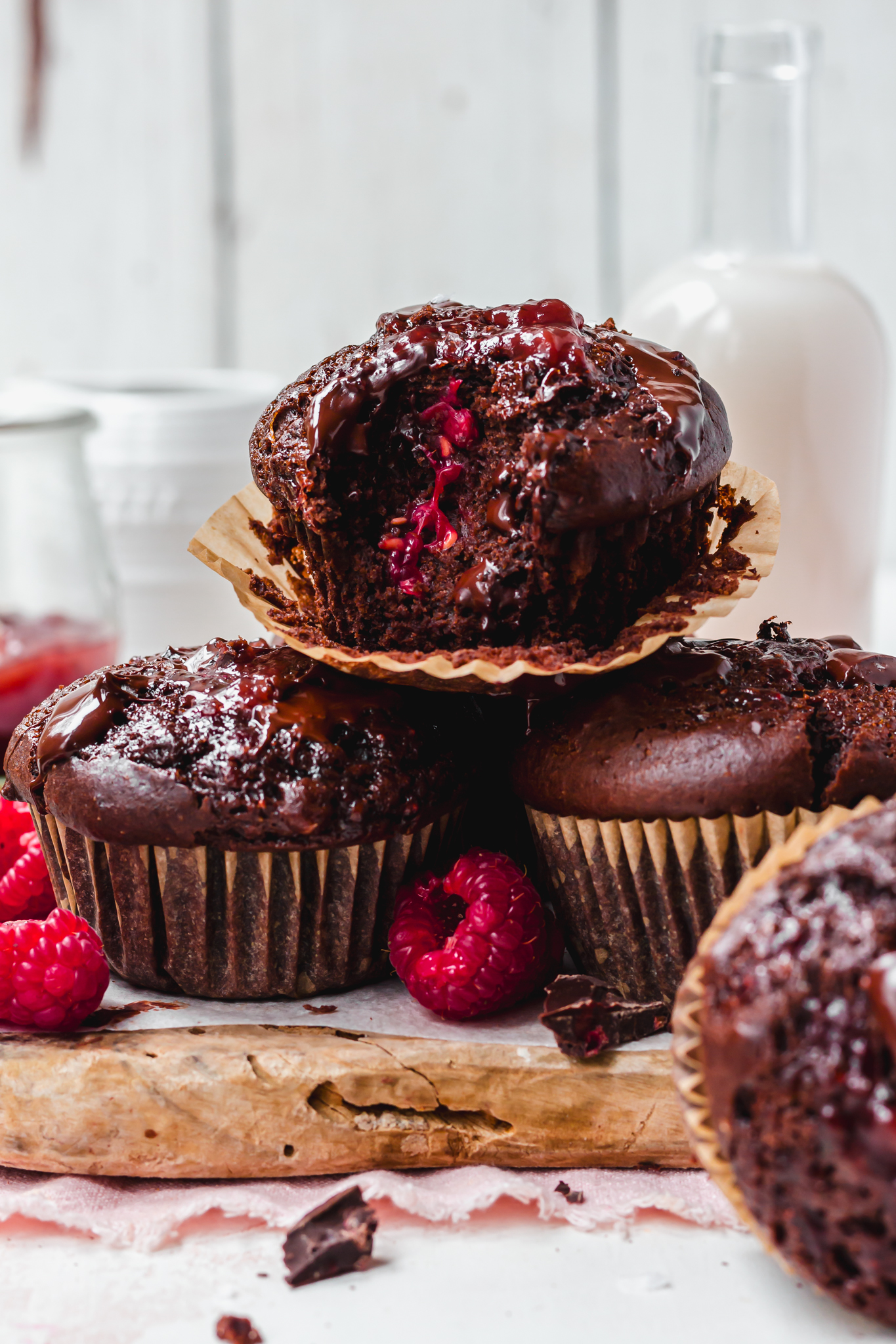 A stack of three Double Chocolate Raspberry Muffins