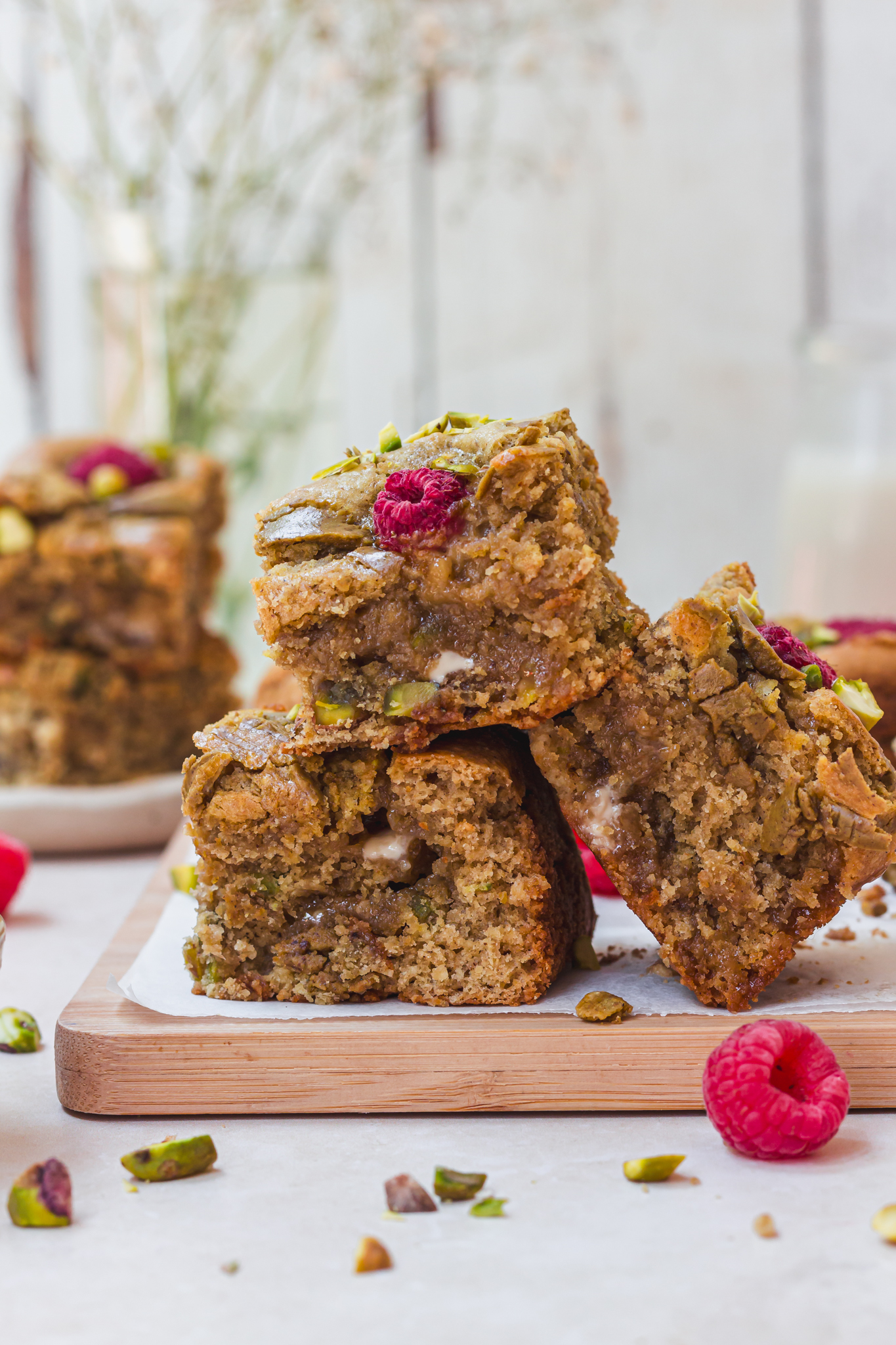 Three squares of Pistachio White Chocolate Raspberry Blondies