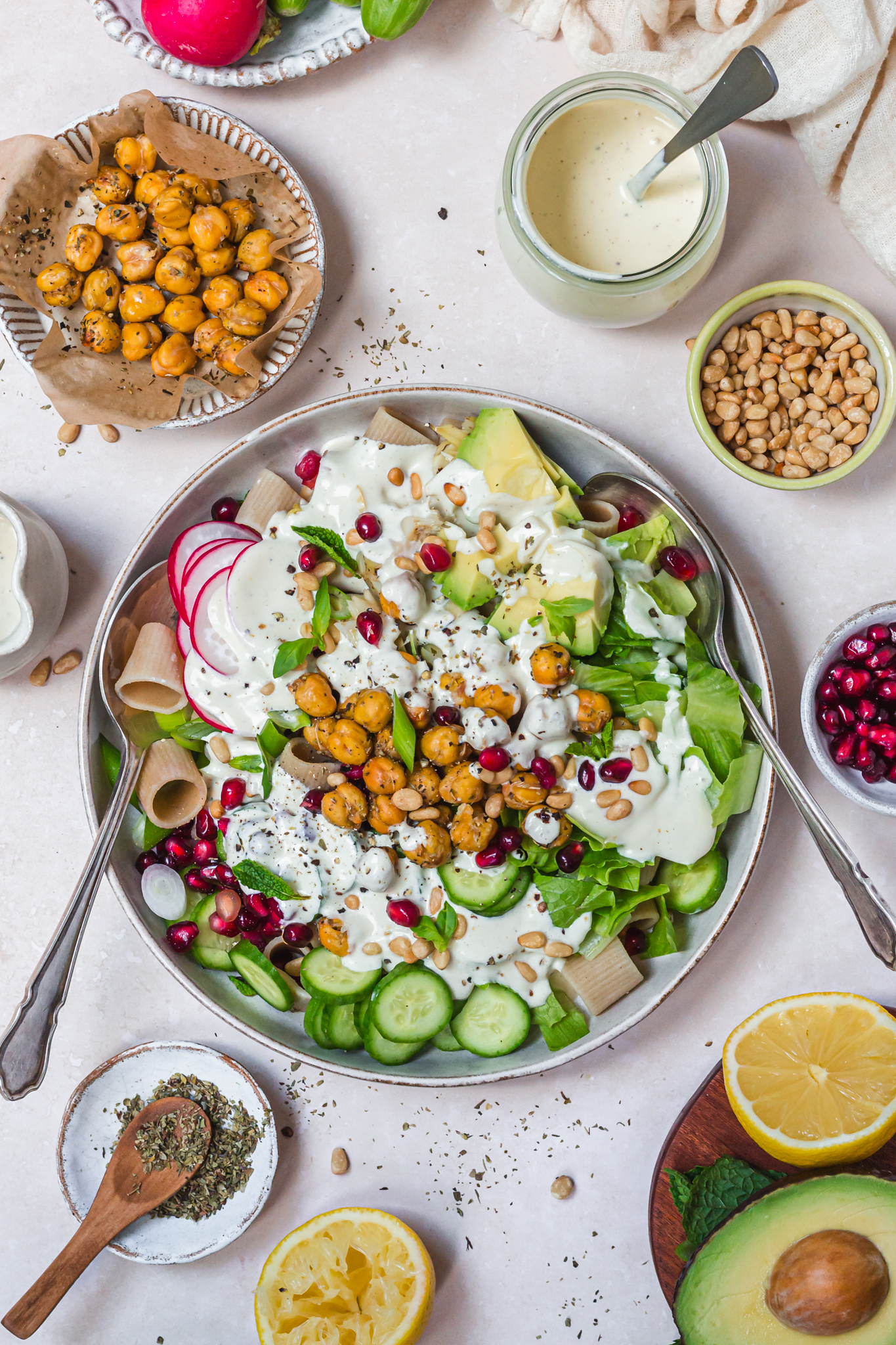 Chickpea Caesar Pasta Salad with two spoons