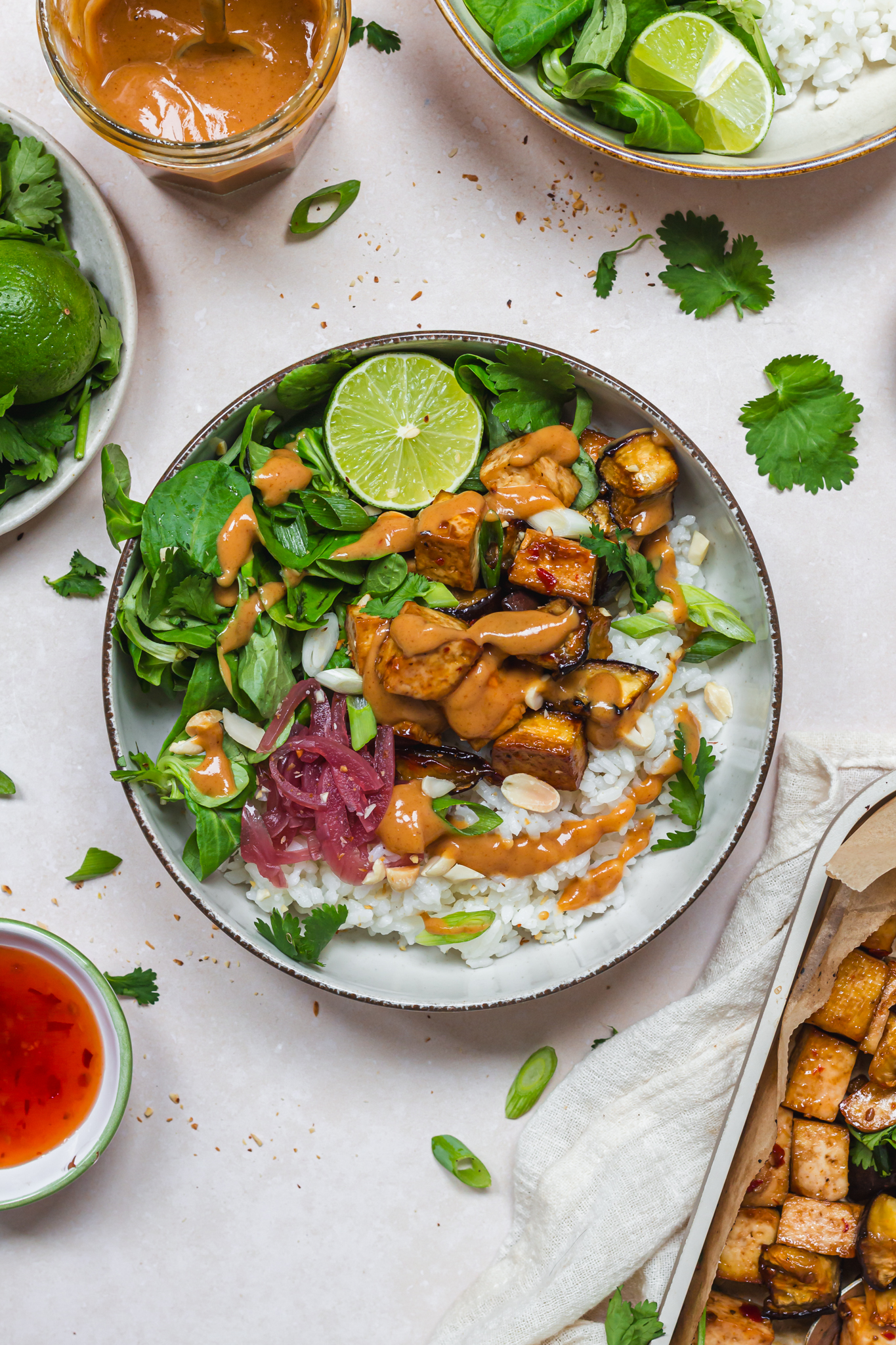 Sweet Chilli Tofu and Aubergine Rice Bowls with satay sauce