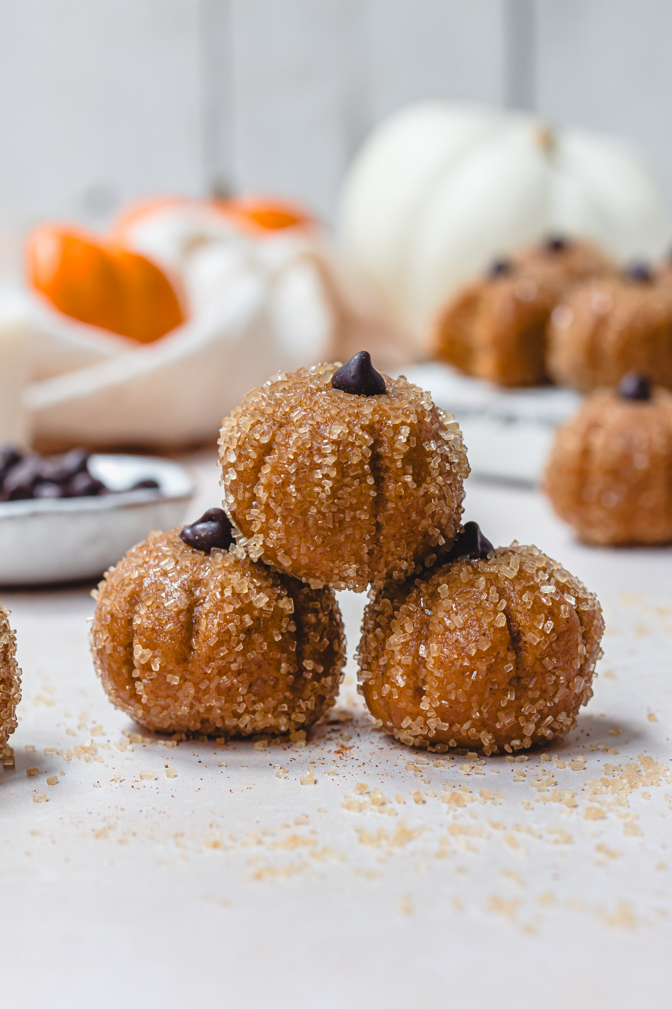 Three Pumpkin-Shaped Truffle Protein Balls