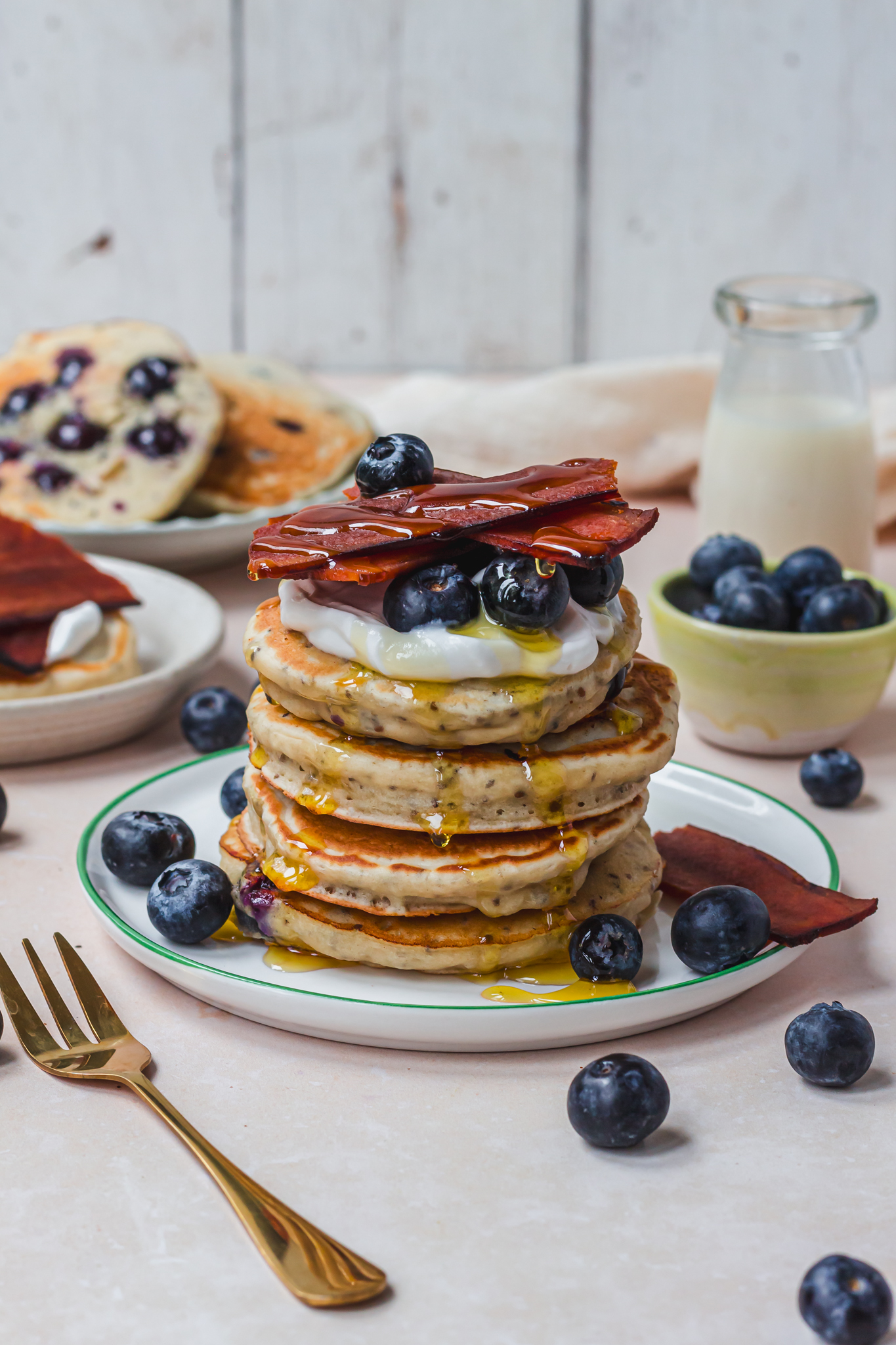 A stack of Vegan Bacon and Blueberry Pancakes