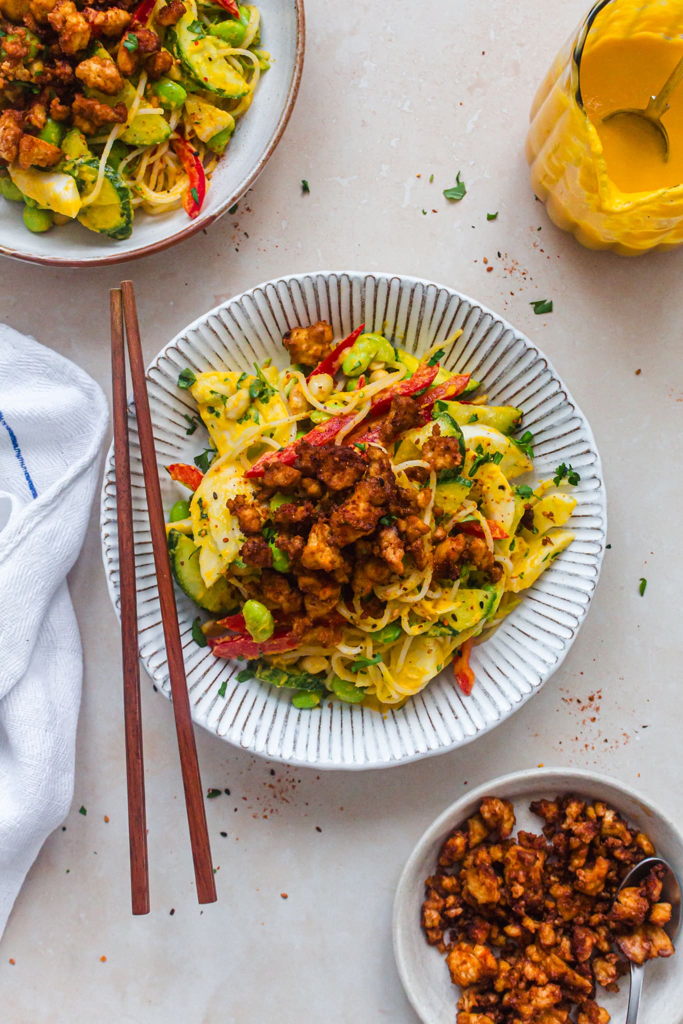 Bowls of Veggie Packed Noodle Salad with Carrot Ginger Dressing