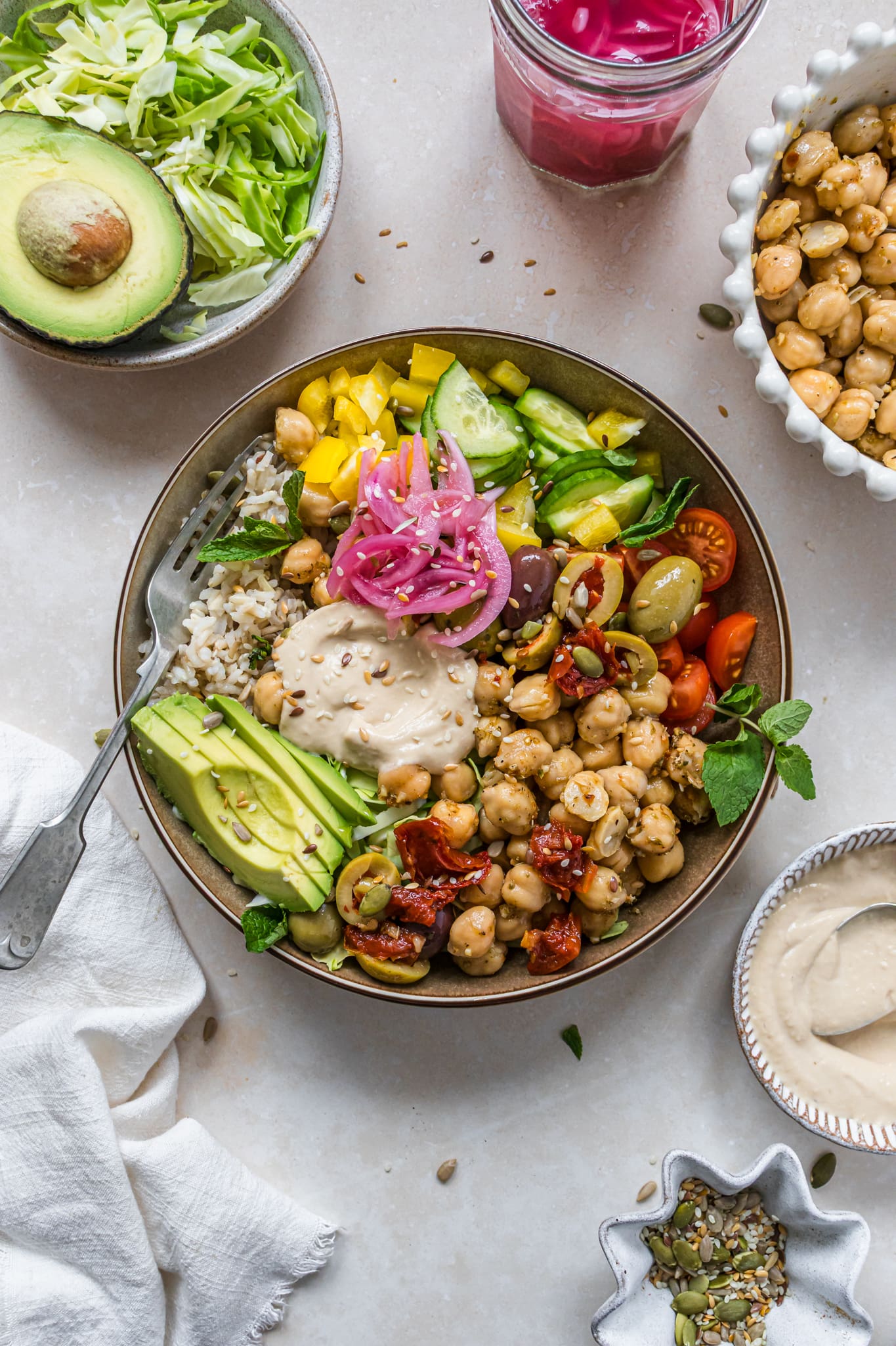 A fork in a Mediterranean Rice Bowl with Chickpeas