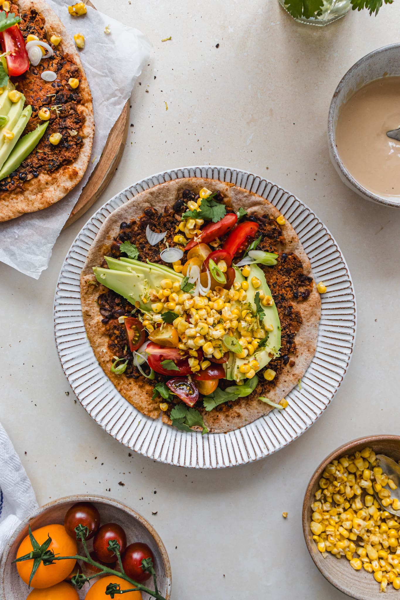 Smashed Black Bean Flatbreads with Avocado on a plate