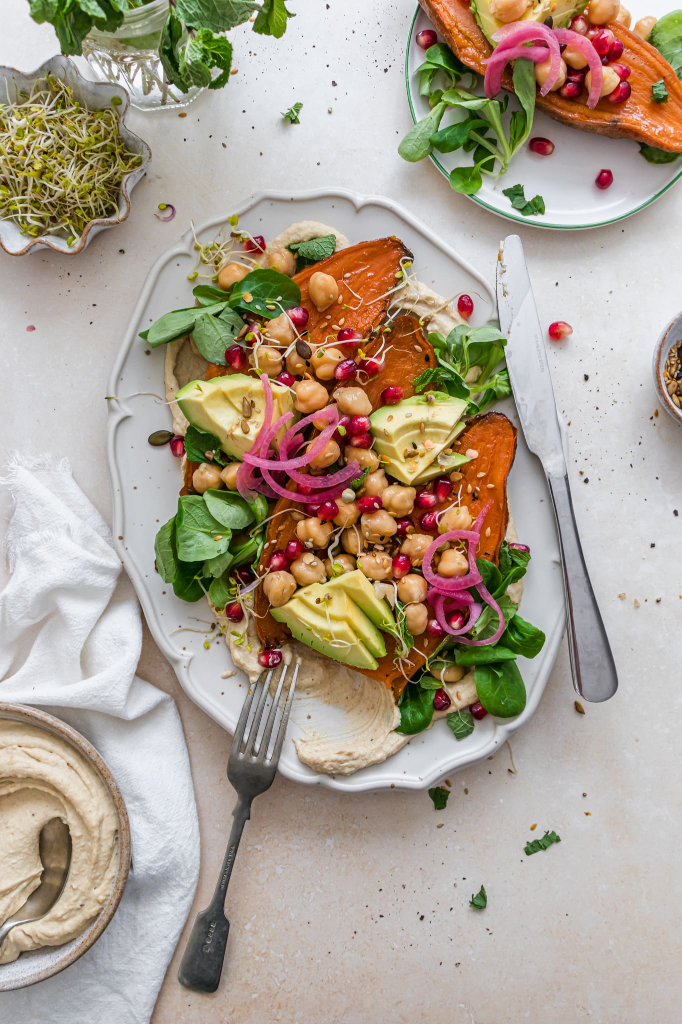 A platter of Creamy Hummus with Sweet Potatoes and Chickpeas